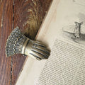 Handclip aus goldfarbenem Messing