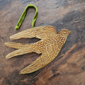 Goldener Geistvogel-Anhänger mit Samtband